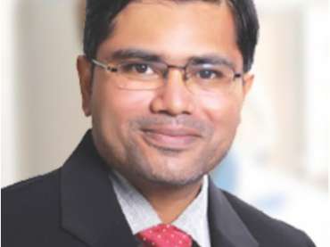 Dr. Natvar Patel